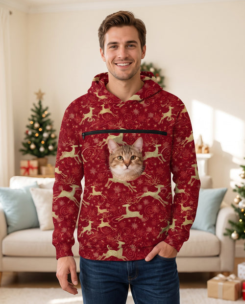 The Holiday Pouch Hoodie with a cat in the pocket