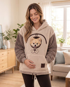 The Teddy Sherpa Pouch Hoodie with a Pomeranian peeking out