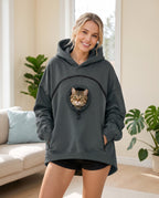 The Zip Pouch Hoodie with a cat peeking out